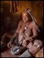 _17C1322 Himba woman washing